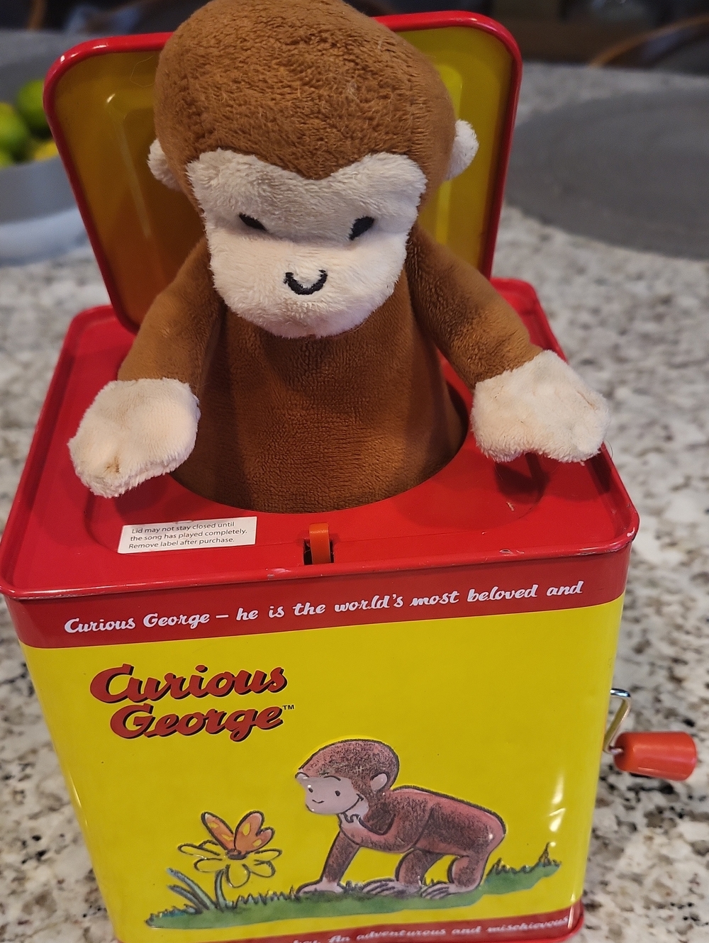 Curious George Jack-in-the-Box Plush Toy.